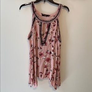 Woman’s open shoulder long sleeve top